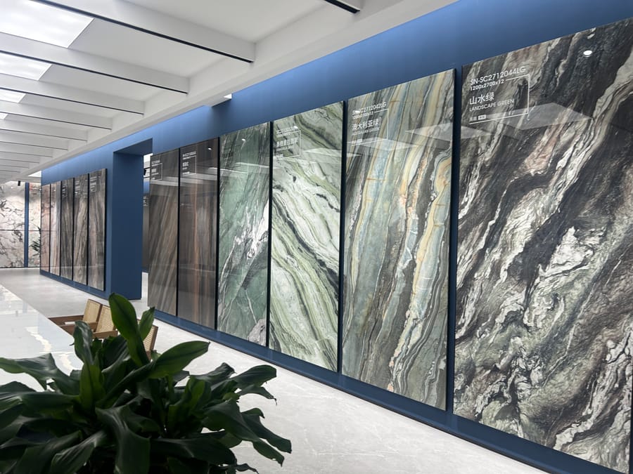 Tile and slab range displayed across a showroom wall