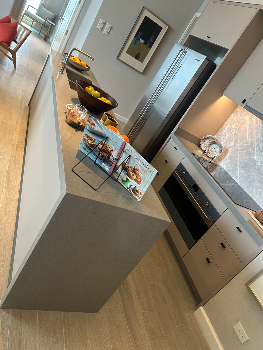 Porcelain slab island installed in a delivered kitchen